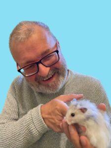 How to become a pet sitter — easy guide by man with hamster
