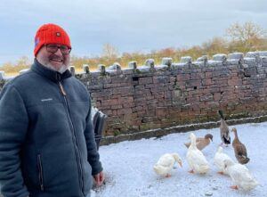 Reliable pet sitter with chickens & ducks in the snow with 5⭐ Trusted House Sitters reviews